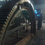 Hardfacing toothed wheel 10