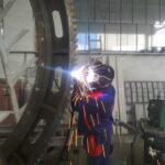 Hardfacing toothed wheel 11