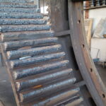 Hardfacing toothed wheel 12